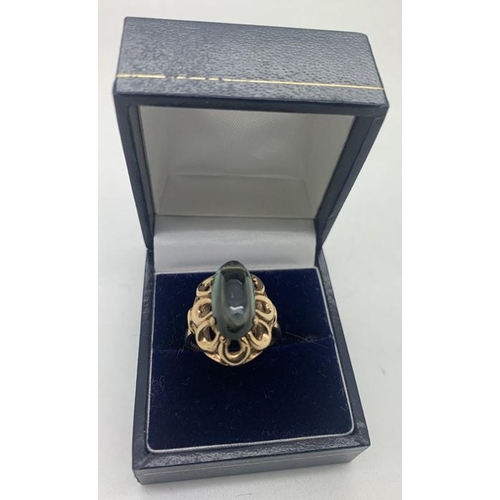 119 - A 9ct gold and tourmaline dress ring, size P, 4.7gms total weight.