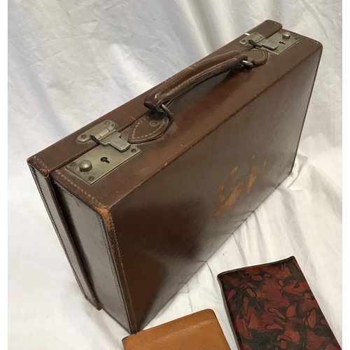 1193 - Small brown leather case with fitted compartment interior and writing pad. 36 w x 24 x 9cms d togeth... 