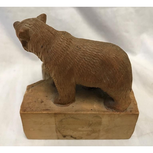 1195 - Small black forest carved bear Beckenried, Switzerland, 9cms h, base 8cms w, 10cms d.