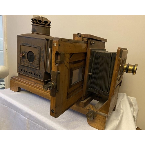 1199 - Thornton Pickard MCC No.6 oak projector with brass lens. 74cms l.