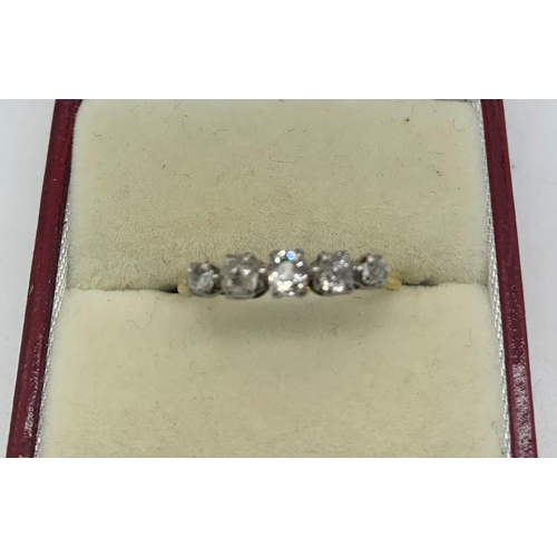 121 - Five stone diamond ring set in yellow metal, marks rubbed, size Q, 2.5gms total.