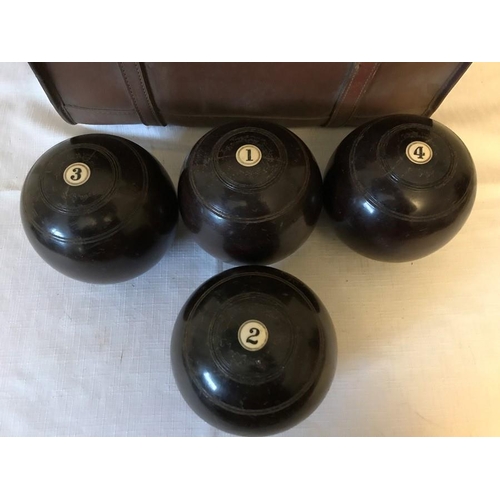 1211 - Four Lignum Vitae bowls in a vintage case.