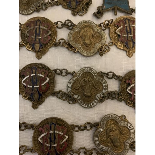 1216 - A large quantity of Masonic badges, and chains including of Order of Royal Buffalos etc.