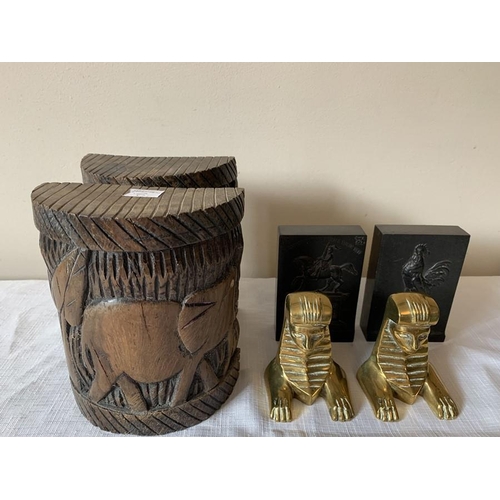 1237 - Three pairs of book ends including brass sphinx, caned wooden elephants 17cms and Le Carbon in slate... 