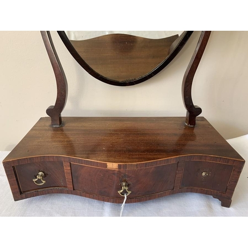 1260 - A 19thC mahogany serpentine front dressing table mirror, 68cms h.