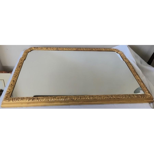 1262 - A 19thC gilt wood framed overmantle mirror. 39 x 67cms.