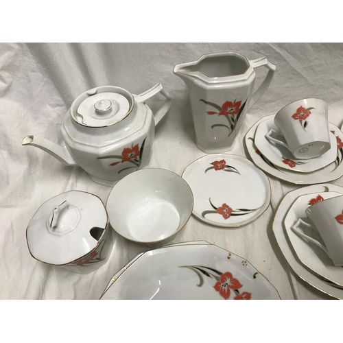 127 - Czechoslovakian bone china floral patterned tea ware, 43 pieces, teapot, hot water jug with plate, l... 