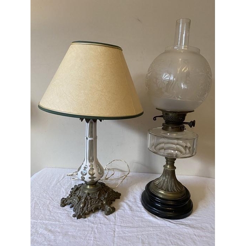 1273 - A 19thC brass and clear glass oil lamp with etched shade and back ceramic base together with a glass... 