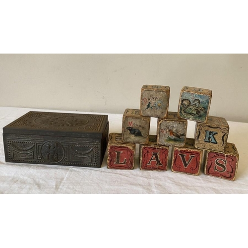 1274 - A vintage metal cigarette box containing various keys and 9 19thC child's building blocks.