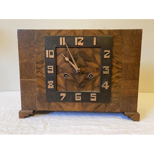 1277 - Art Deco clock, burr walnut and oak with original key. 29.5 x 22cms, marked on movement with crossed... 