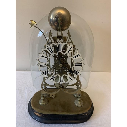 1281 - A 19thC skeleton clock with associated glass dome, dome 38 h x 34cms w approximately.