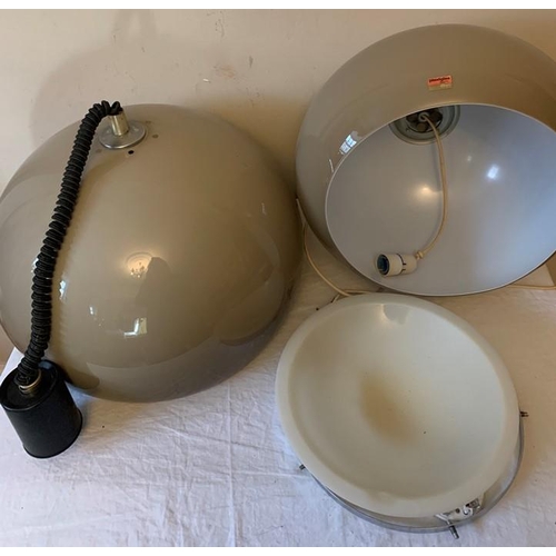 1284 - Two 1970's Plexiglas and aluminium height adjustable ceiling lights. Retailed through Heals, one wit... 