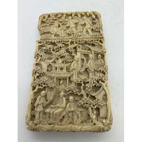 1290 - Ivory visiting card case with highly decorated deep carving with trees, people, boats and temples. 9... 