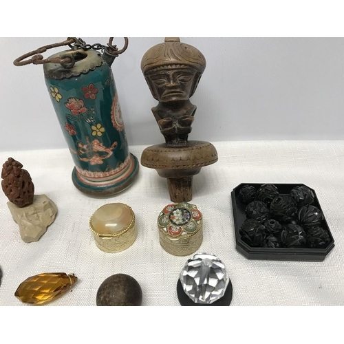 1294 - Selection of small items, Aztec carving bottle stopper, carved monkey nut, musket ball, jet beads, p... 