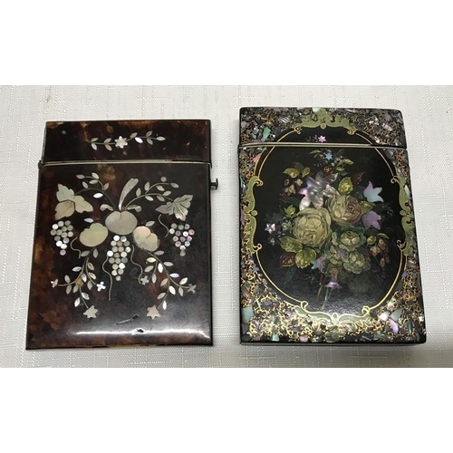 130 - Two 19thC card cases. Tortoiseshell with mother of pearl inlay floral design 10.5 x 8cms and black l... 