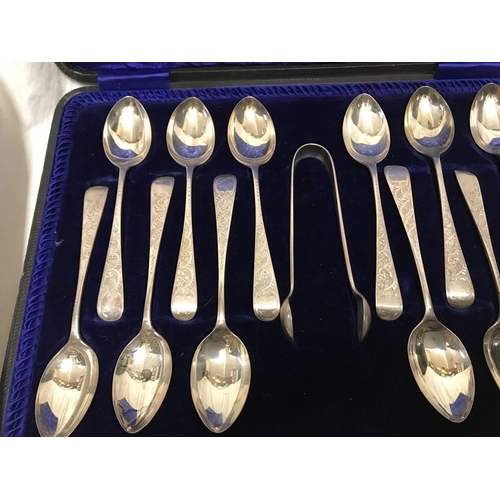 133 - Hallmarked silver cased set of 12 teaspoons plus sugar tongs with engraved handles. J.S. Sheffield 1... 