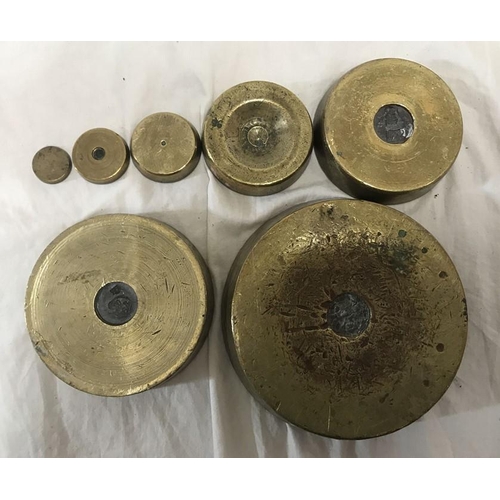 150 - Set of Victorian Avery brass weights, quarter ounce to four pound.