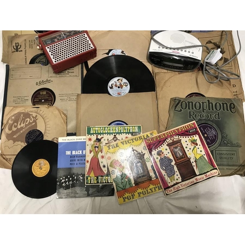 151 - An ITT Pony portable radio, Roberts CR 9971 clock radio and a selection of 78 rpm and 45 rpm records... 