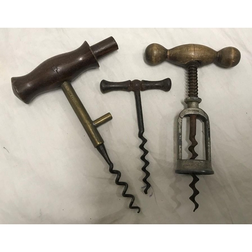 155 - Three assorted corkscrews, Hercules beech handled 15cms l, Coney's patent brass stem 16cms l and a s... 