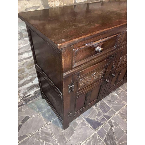 1588 - Oak Old Charm Style sideboard, three drawers over three cupboards.137w x 47d x 85h,cms.