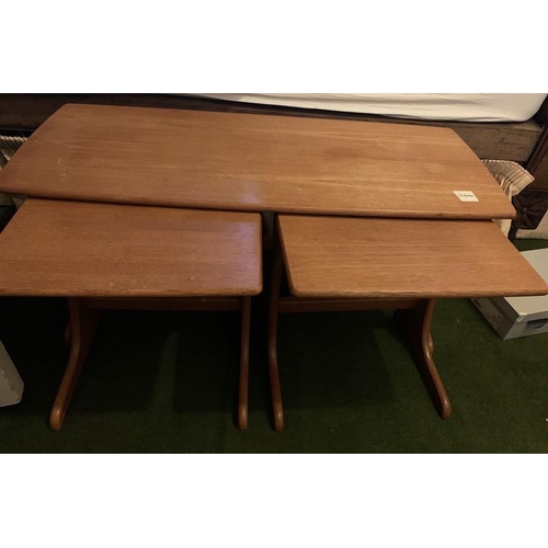 1598 - A mid century teak coffee table 99 x 40cms with two nesting tables.