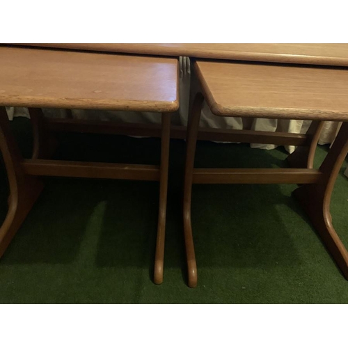 1598 - A mid century teak coffee table 99 x 40cms with two nesting tables.