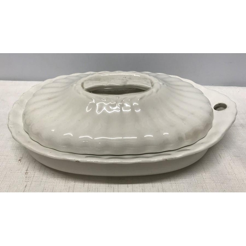 161 - A 19thC white pottery food warmer dish. 30cms w x 20cms x 9cms h.