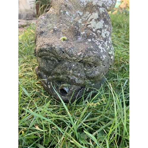 1624 - A reconstituted stone fountain, child on fish. 33cms h.