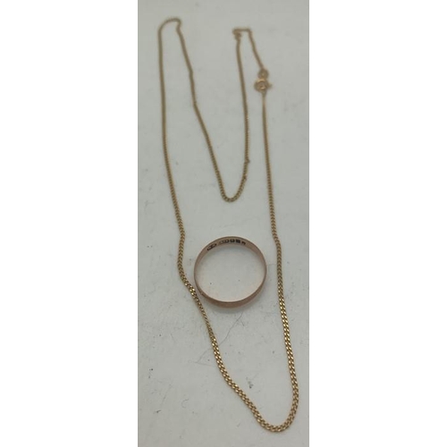 165 - A 9ct gold chain, 50cms l, a 9ct gold wedding band, size M and a 9ct gold earring back. 2.6gms total... 