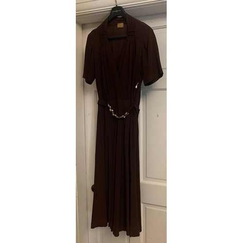 169 - A vintage 1940's brown crepe dress and underslip, labelled Princess frocks size 20, side zip, a gilt... 