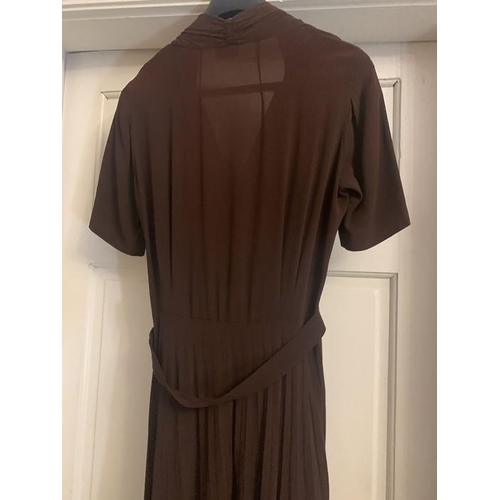 169 - A vintage 1940's brown crepe dress and underslip, labelled Princess frocks size 20, side zip, a gilt... 