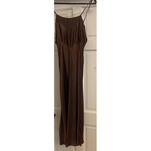 169 - A vintage 1940's brown crepe dress and underslip, labelled Princess frocks size 20, side zip, a gilt... 