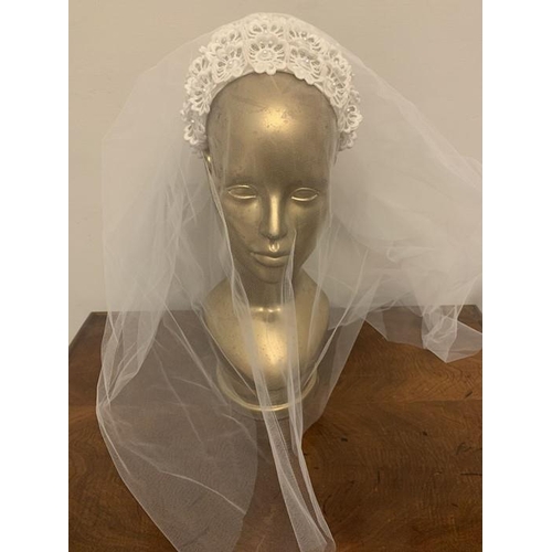 175 - A vintage bridal headdress with veil in original box from Kendals, Manchester.