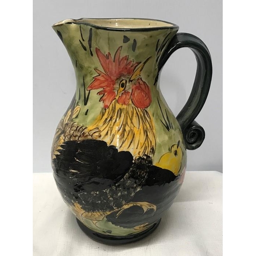 176 - Paul Jackson Studio pottery jug circa 98, Chickens and Chicks design. 24.5cms h.