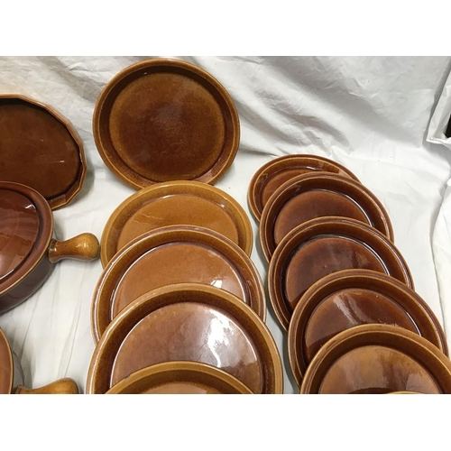 181 - Wattisfield ware, Suffolk, brown stoneware pottery dinner and cooking ware. 42 pieces. Tureens, dinn... 