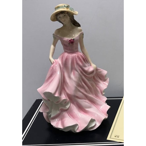 189 - Royal Doulton figurine Kate charity figure C2000, HN4233, 22cms h with certificate together with two... 