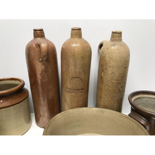 194 - Ironstone pottery Kitchenware, storage jars, three tall bottles 30cms h, baking dish, jugs including... 