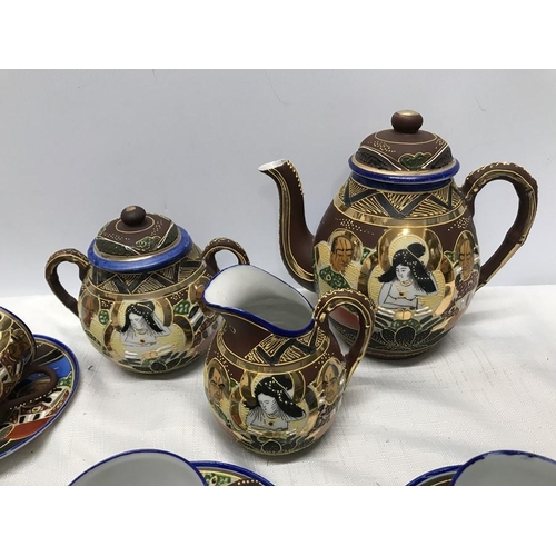 196 - Decorative Japanese tea set, teapot, milk jug, sugar bowl, 11 cups, 12 saucers (26 pieces)