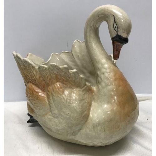 197 - Large pottery Swan jardiniere 30cms h, approx. length 34cms, approx. 24cms w.