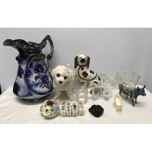 200 - Mixed lot, large water jug blue floral design, 33cms h, Pottery dog with glass eyes 22cms h, etched ... 