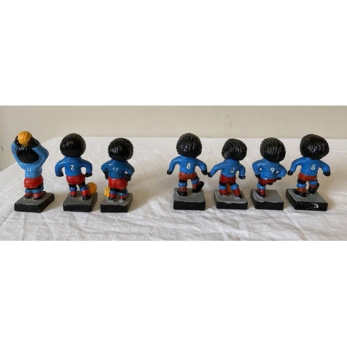 204 - A group of 7  Robertson Golly footballers, 3 x 'hand painted foreign', 4 x plastic.