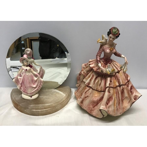 212 - Small Royal Doulton figurine, 17.5cms h stood on a half round onyx base with circular mirror back, o... 