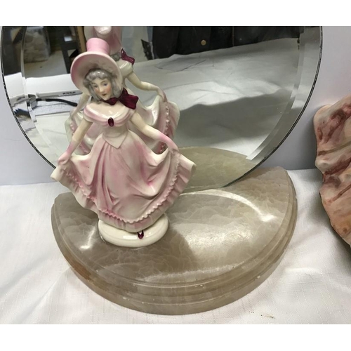 212 - Small Royal Doulton figurine, 17.5cms h stood on a half round onyx base with circular mirror back, o... 