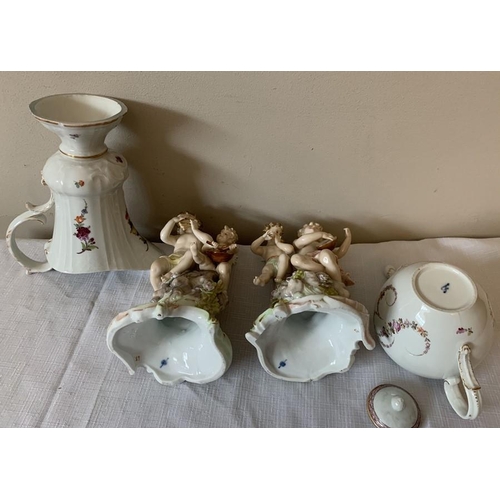 216 - Continental porcelain to include putti figurines, playing instruments, 20cms h, a teapot, jug and a ... 