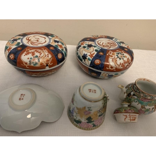 219 - Oriental ceramics to include two Japanese Imari lidded bowls, Satsuma cup and saucer with missing ha... 