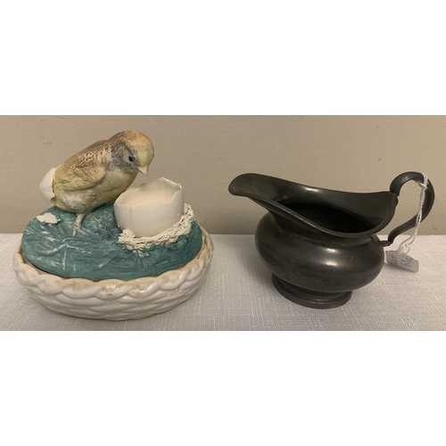 220 - A 19thC lidded box with hatching chick to top. 13cms l x 10cms w with Dixon and Son pewter jug.