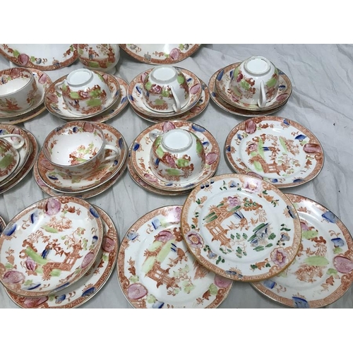 222 - A part tea service, 2 cake plates, jug, 11 cups, 12 saucers, 16 side plates, garden design. 1 bowl. ... 