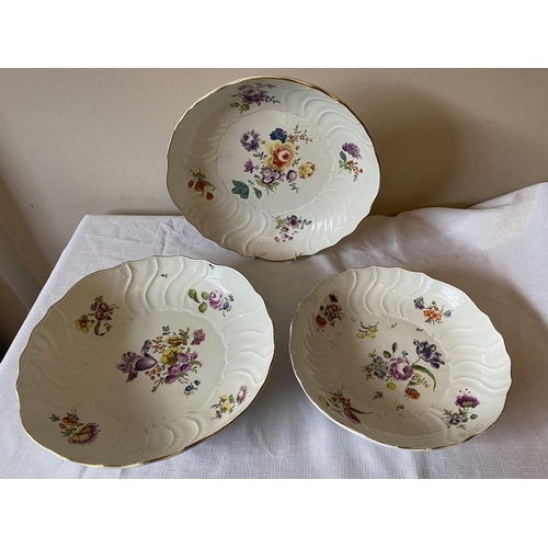 228 - Three 18thC Meissen dishes, two 28cms d, one at 25cms d decorated with floral sprigs.