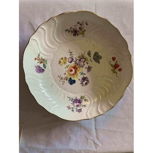 228 - Three 18thC Meissen dishes, two 28cms d, one at 25cms d decorated with floral sprigs.