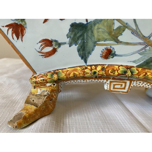 231 - A 19thC floral encrusted basket with a continental planter.